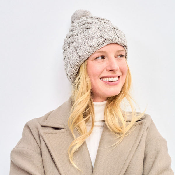 Clifden Cable Aran Oat Hat with Pom Poms