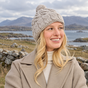 Clifden Cable Aran Oat Hat with Pom Poms