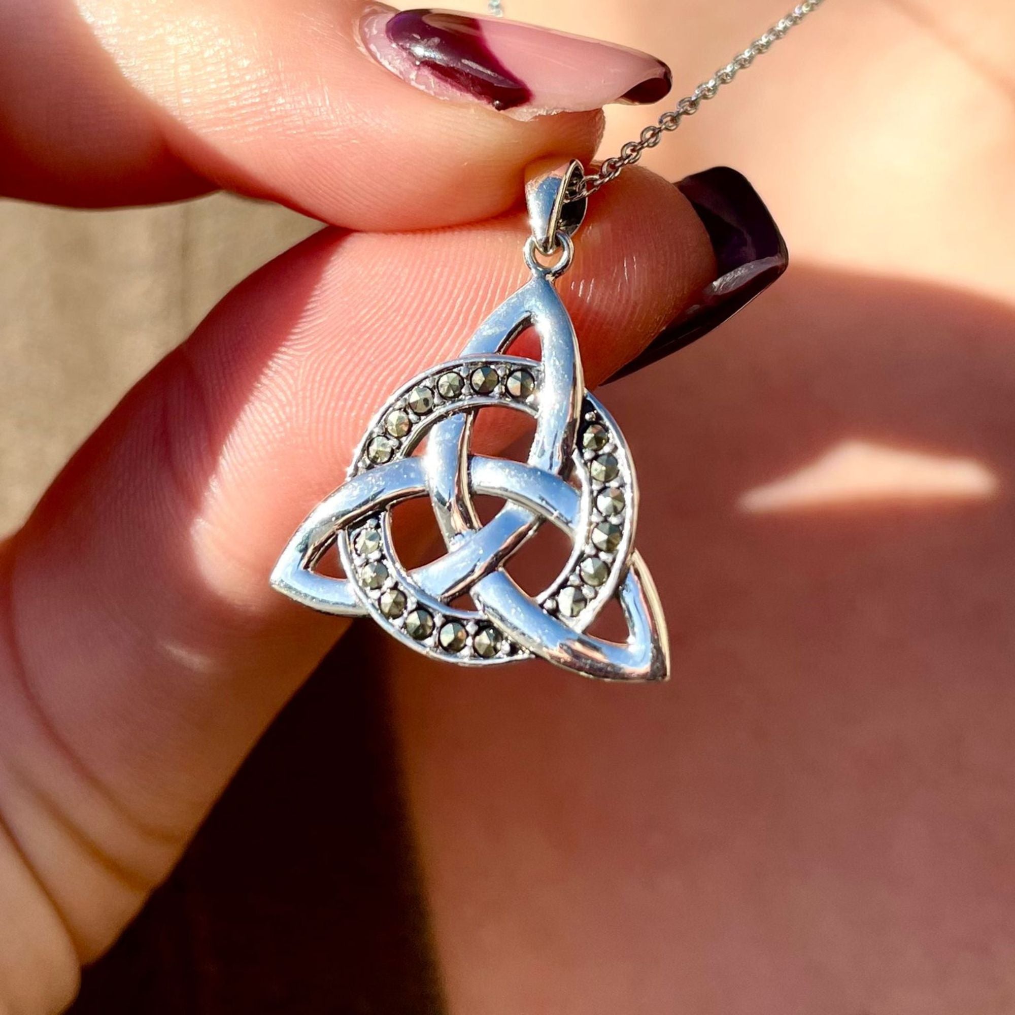 Silver Trinity Knot Pendant with Marcasite Stones
